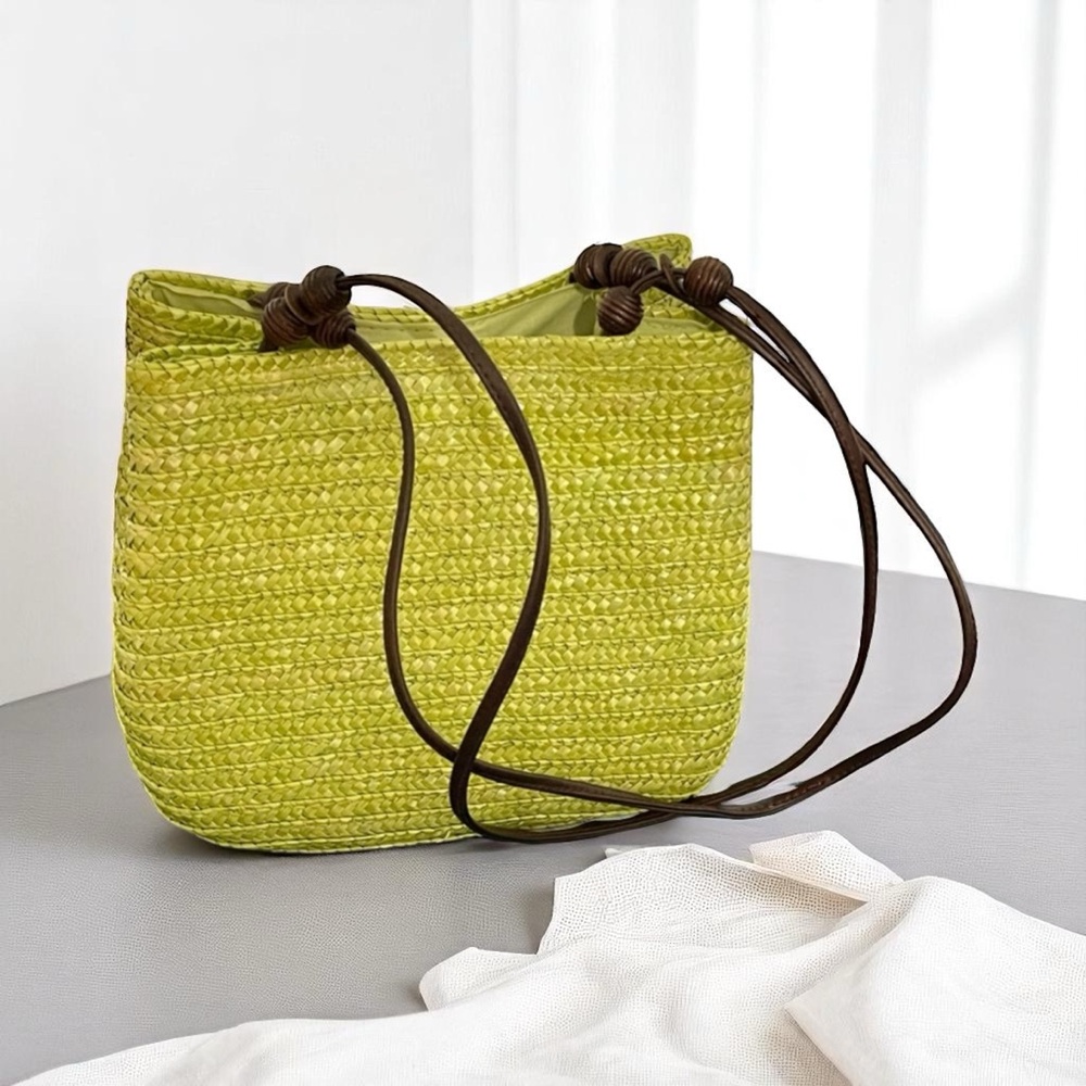 Handwoven Green Purse with Leather Shoulder Handles and Decorative Knobs